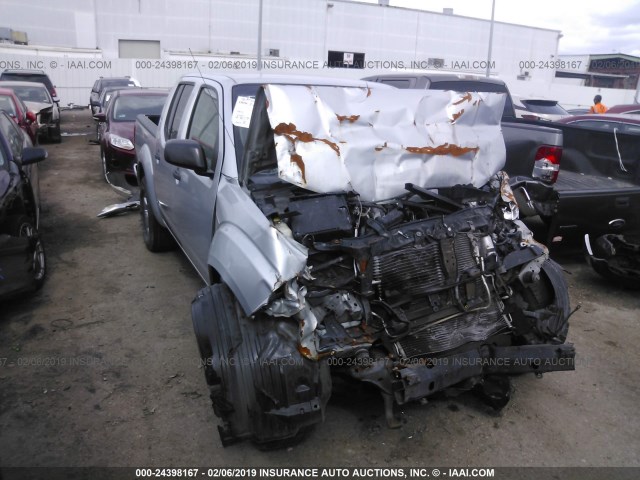 1N6AD07U49C424050 - 2009 NISSAN FRONTIER CREW CAB SE/LE/NISMO SILVER photo 1