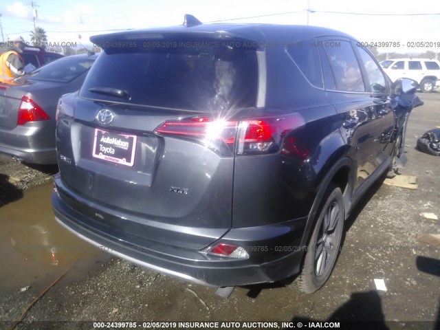 2T3WFREV2JW413522 - 2018 TOYOTA RAV4 ADVENTURE/XLE GRAY photo 4