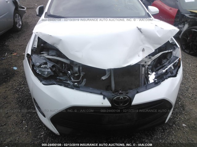 5YFBURHEXHP594664 - 2017 TOYOTA COROLLA L/LE/XLE/SE/XSE WHITE photo 6