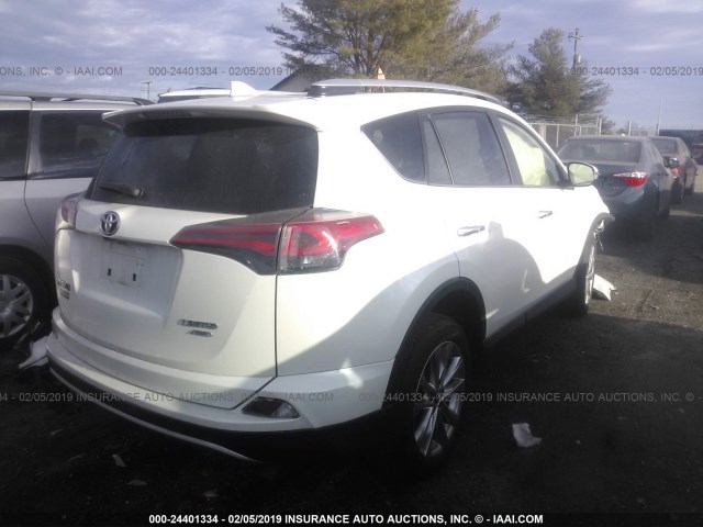 JTMDFREV8GJ070391 - 2016 TOYOTA RAV4 LIMITED WHITE photo 4