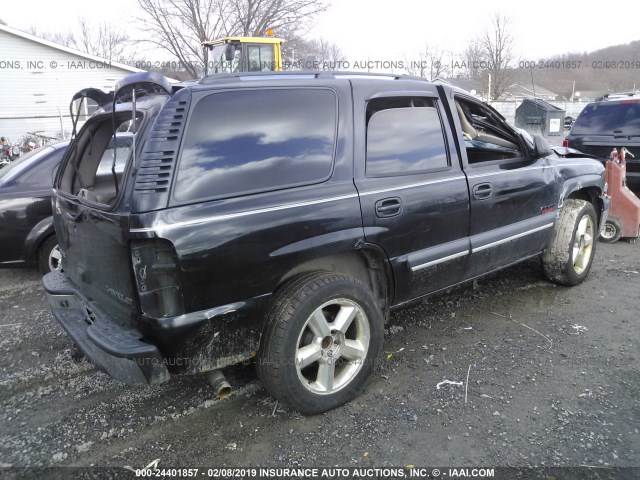 1GNEK13T04R101799 - 2004 CHEVROLET TAHOE K1500 BLACK photo 4