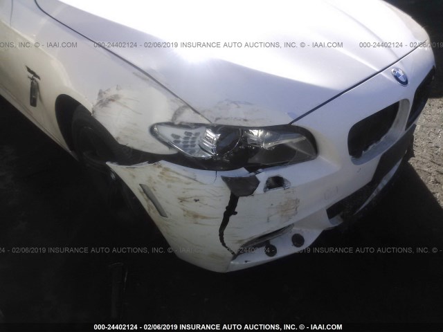 WBAFU9C59BC784574 - 2011 BMW 550 XI WHITE photo 6