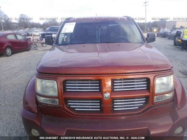 1D8GT58638W114760 - 2008 DODGE NITRO R/T ORANGE photo 6