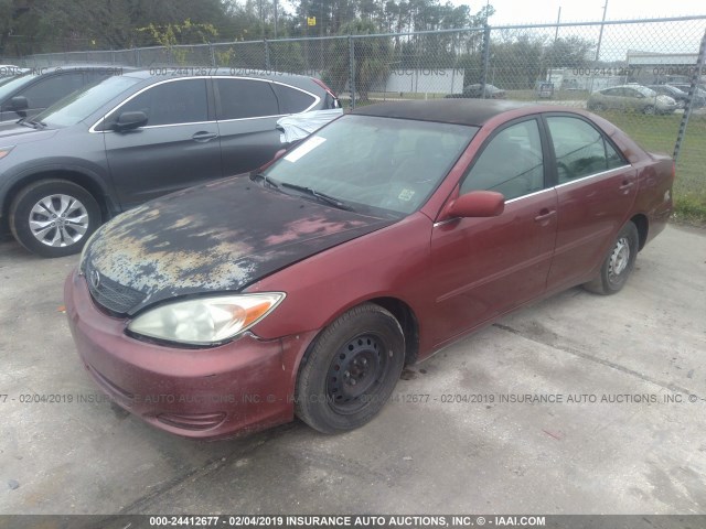 4T1BE32KX2U065987 - 2002 TOYOTA CAMRY LE/XLE/SE RED photo 2