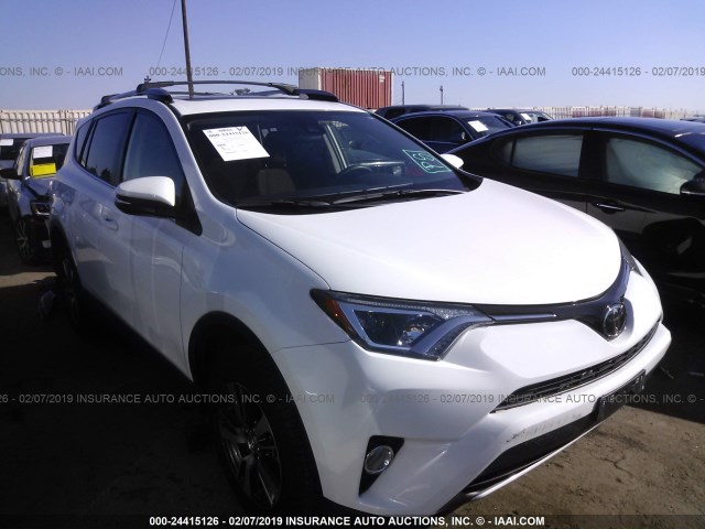 JTMWFREV5JD120811 - 2018 TOYOTA RAV4 ADVENTURE/XLE WHITE photo 1