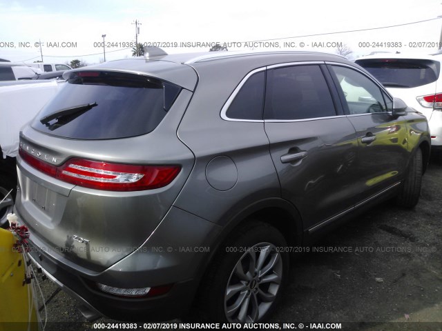 5LMCJ2C93HUL28011 - 2017 LINCOLN MKC SELECT BLACK photo 4