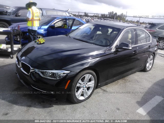 WBA8B9C51JEE81051 - 2018 BMW 330 I BLACK photo 2