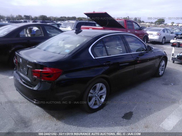 WBA8B9C51JEE81051 - 2018 BMW 330 I BLACK photo 4