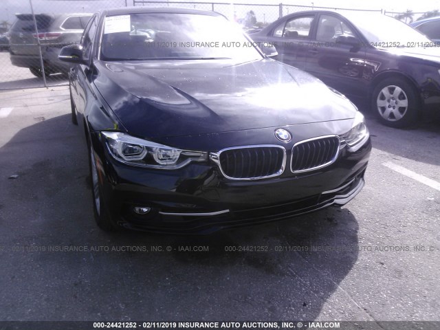 WBA8B9C51JEE81051 - 2018 BMW 330 I BLACK photo 6