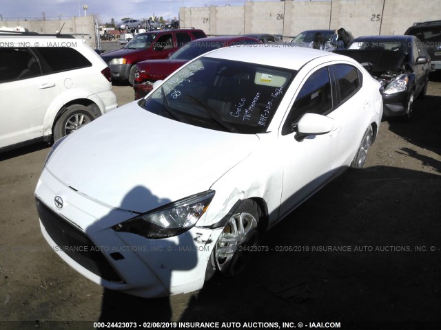 3MYDLBZV6GY112256 - 2016 TOYOTA SCION IA WHITE photo 2