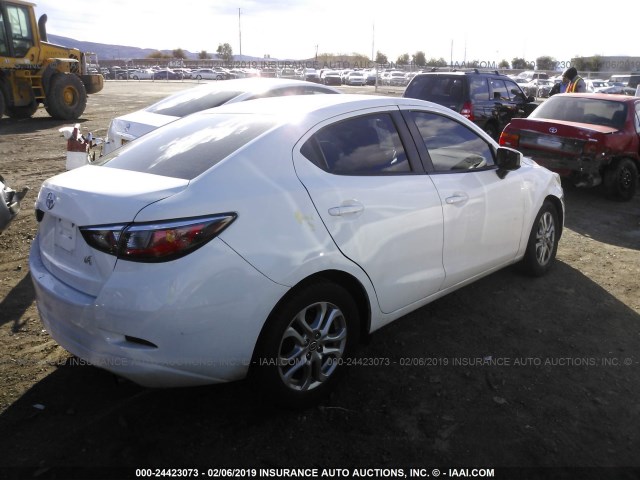 3MYDLBZV6GY112256 - 2016 TOYOTA SCION IA WHITE photo 4