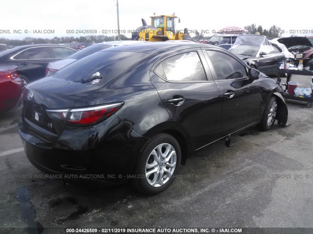 3MYDLBZV6GY107770 - 2016 TOYOTA SCION IA BLACK photo 4