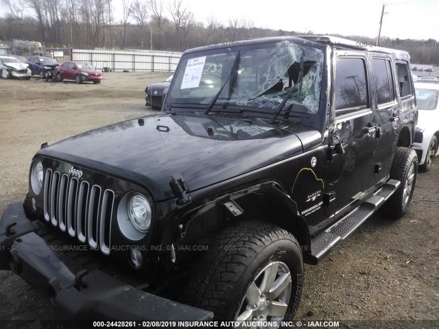 1C4BJWEG2HL651400 - 2017 JEEP WRANGLER UNLIMITE SAHARA BLACK photo 2