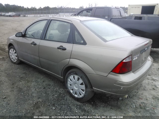 1FAFP34N45W200998 - 2005 FORD FOCUS ZX4 TAN photo 3