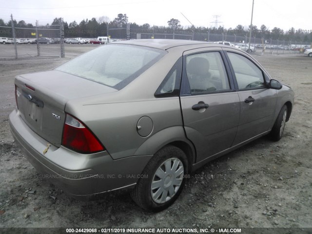 1FAFP34N45W200998 - 2005 FORD FOCUS ZX4 TAN photo 4