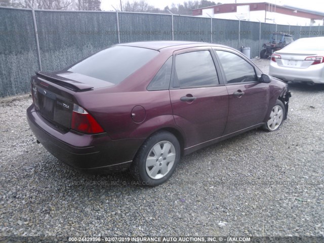 1FAFP34NX6W121689 - 2006 FORD FOCUS ZX4 MAROON photo 4