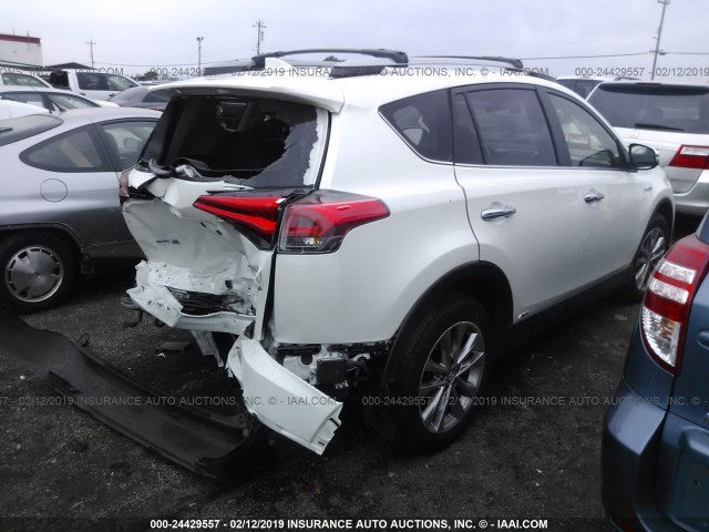 JTMDJREV0JD201866 - 2018 TOYOTA RAV4 HV LIMITED WHITE photo 4