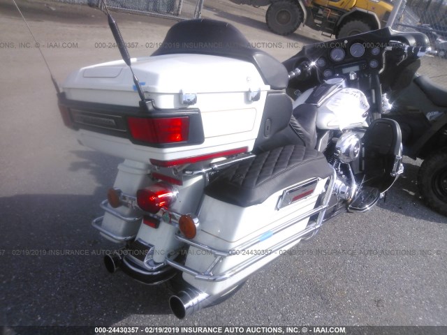 1HD1FC4167Y618005 - 2007 HARLEY-DAVIDSON FLHTCUI WHITE photo 4