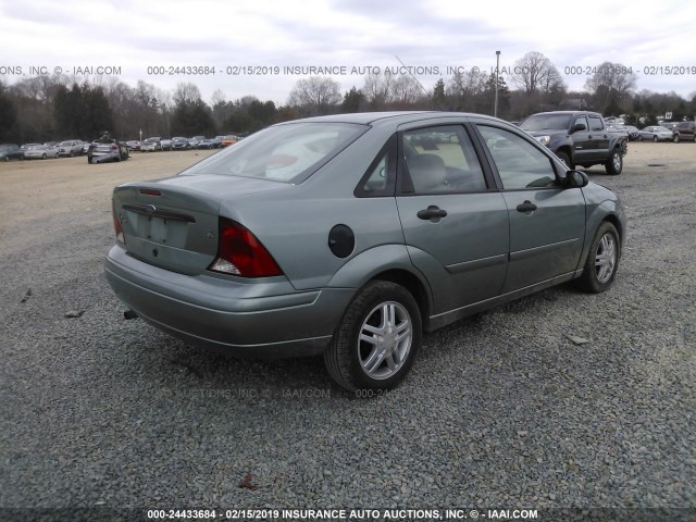 1FAFP343X3W181532 - 2003 FORD FOCUS SE COMFORT/SE SPORT GREEN photo 4