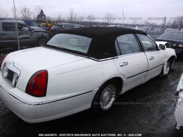 1LNHM81W5XY681479 - 1999 LINCOLN TOWN CAR EXECUTIVE WHITE photo 4