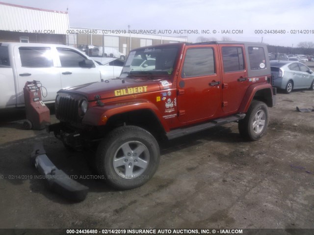 1J4GA59159L732120 - 2009 JEEP WRANGLER UNLIMITE SAHARA ORANGE photo 2