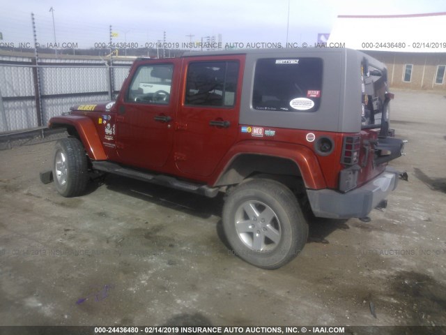 1J4GA59159L732120 - 2009 JEEP WRANGLER UNLIMITE SAHARA ORANGE photo 3