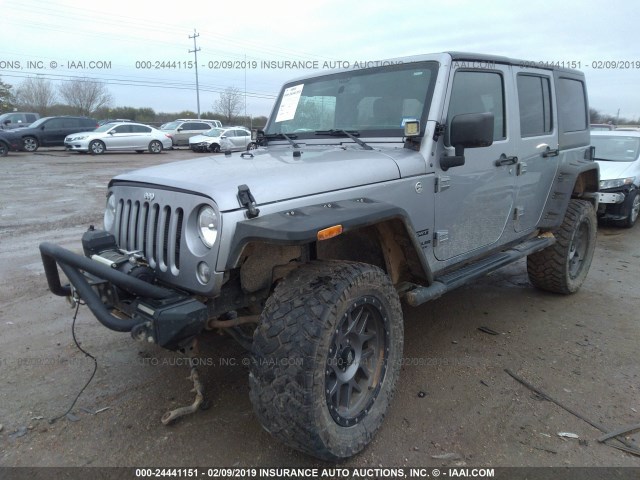 1C4BJWDG6FL750591 - 2015 JEEP WRANGLER UNLIMITE SPORT SILVER photo 2