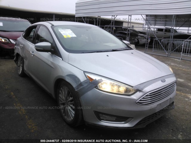 1FADP3J28FL240487 - 2015 FORD FOCUS TITANIUM SILVER photo 1