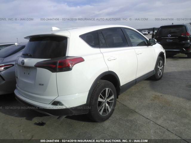 2T3WFREV7JW468810 - 2018 TOYOTA RAV4 ADVENTURE/XLE WHITE photo 4