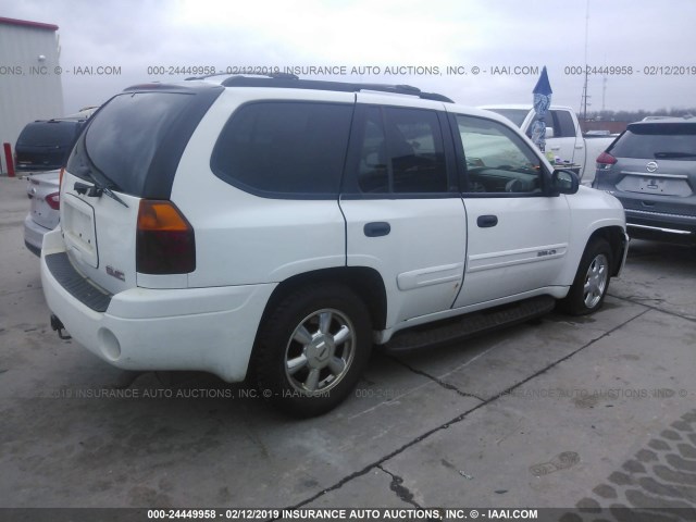 1GKDT13S842367576 - 2004 GMC ENVOY WHITE photo 4