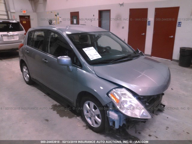 3N1BC13EX9L477793 - 2009 NISSAN VERSA S/SL GRAY photo 1