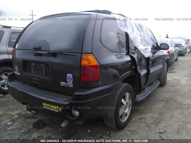 1GKDS13S552360668 - 2005 GMC ENVOY BLACK photo 4