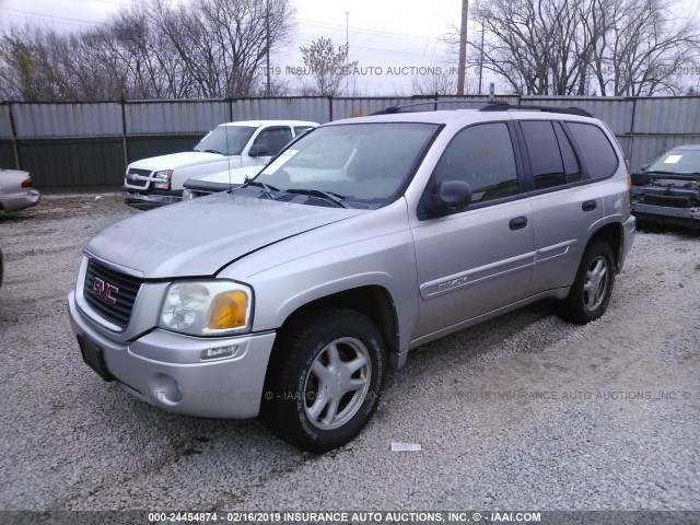 1GKDT13S542349097 - 2004 GMC ENVOY SILVER photo 2