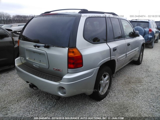 1GKDT13S542349097 - 2004 GMC ENVOY SILVER photo 4