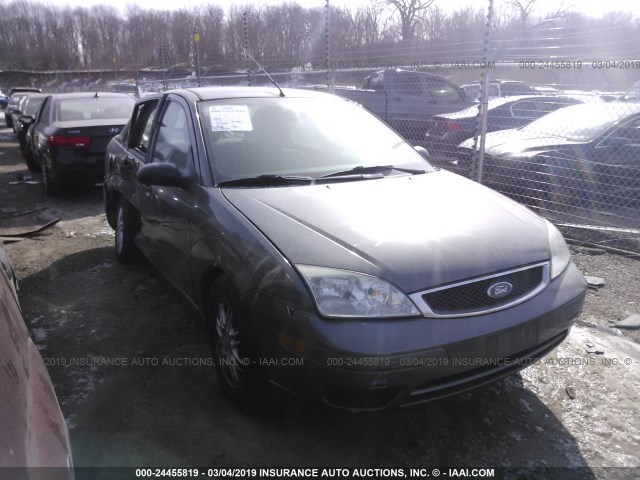 1FAHP34N76W108665 - 2006 FORD FOCUS ZX4 GRAY photo 1