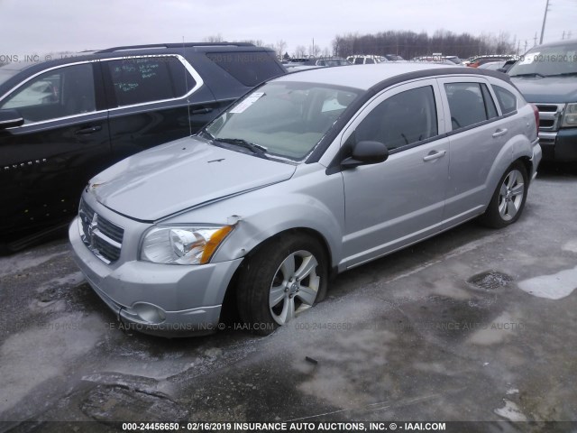 1B3CB3HA0BD113868 - 2011 DODGE CALIBER MAINSTREET SILVER photo 2