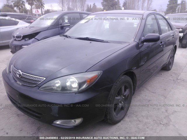 JTDBE30K420049606 - 2002 TOYOTA CAMRY LE/XLE/SE BLACK photo 2