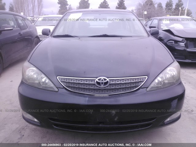 JTDBE30K420049606 - 2002 TOYOTA CAMRY LE/XLE/SE BLACK photo 6