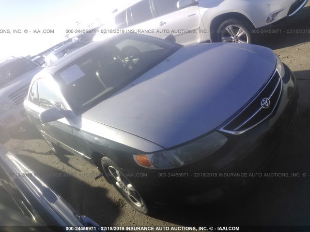 2T1CF28P4YC273954 - 2000 TOYOTA CAMRY SOLARA SE/SLE GREEN photo 1