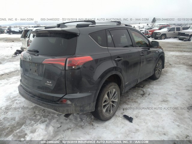 JTMRJREV6JD188577 - 2018 TOYOTA RAV4 HV LE PLUS/XLE GRAY photo 4