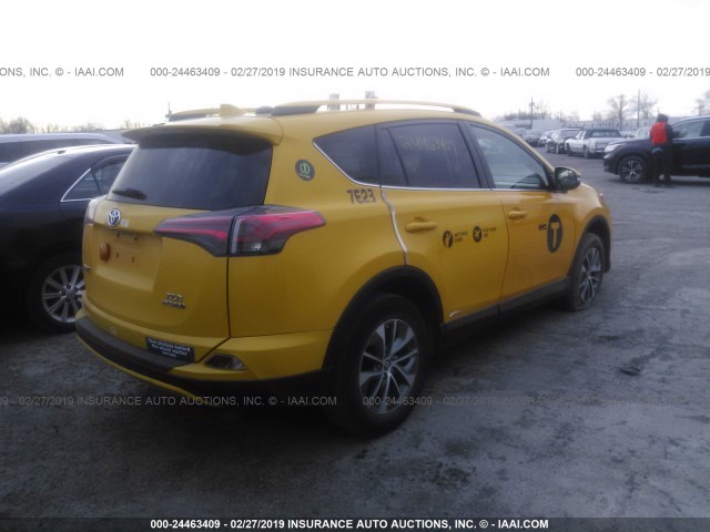 JTMRJREV9GD012454 - 2016 TOYOTA RAV4 HV XLE YELLOW photo 4