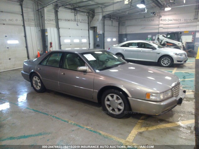 1G6KY529XVU840090 - 1997 CADILLAC SEVILLE STS SILVER photo 1