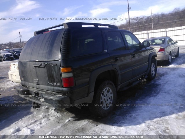 1GNEK13Z74R212547 - 2004 CHEVROLET TAHOE K1500 BLACK photo 4