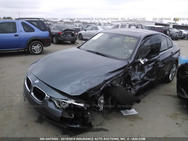 WBA8B9G57JNV00144 - 2018 BMW 330 I GRAY photo 2