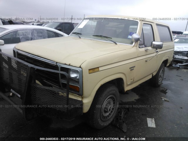 1FMEU15F8ELA11472 - 1984 FORD BRONCO U100 YELLOW photo 2