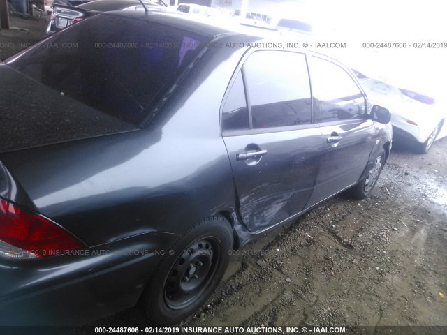 JA3AJ26EX3U018470 - 2003 MITSUBISHI LANCER ES BLACK photo 6