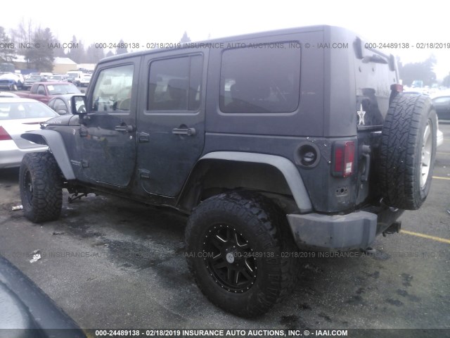 1J4HA6H15AL128678 - 2010 JEEP WRANGLER UNLIMITE RUBICON BLACK photo 3