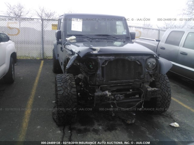 1J4HA6H15AL128678 - 2010 JEEP WRANGLER UNLIMITE RUBICON BLACK photo 6