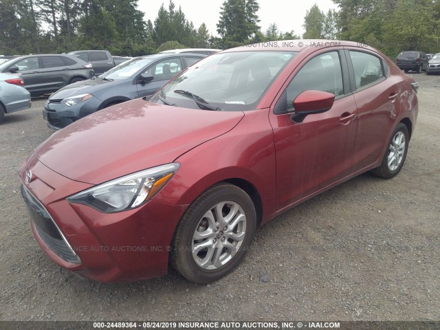 3MYDLBZVXGY121767 - 2016 TOYOTA SCION IA RED photo 2