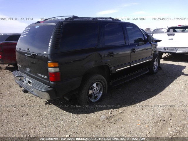 1GNEK13T95R264629 - 2005 CHEVROLET TAHOE K1500 BLACK photo 4